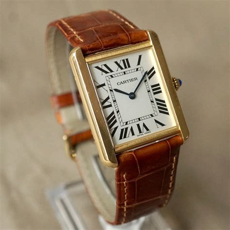 cartier tank gold man